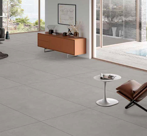 Wicky Grey Tile in a modern living space with sleek furniture and large windows showcasing a stylish interior design.
